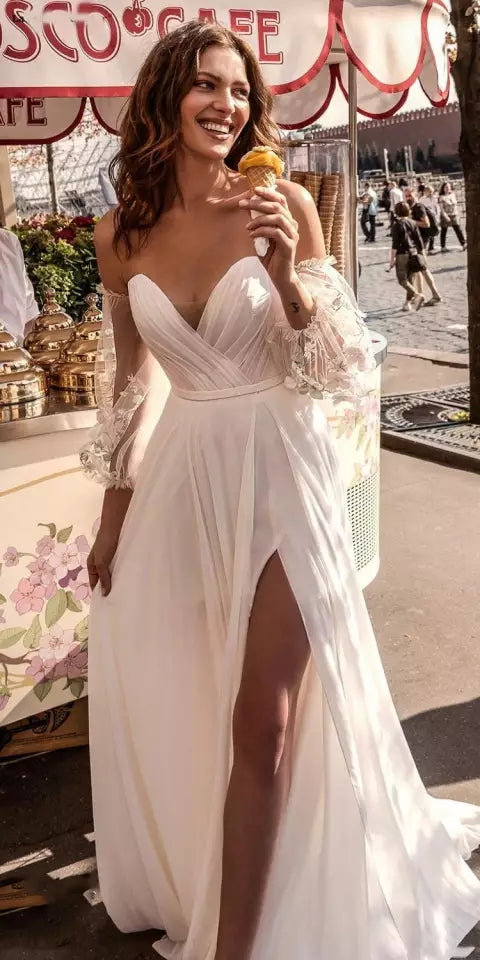 Vestido de novia de gasa de encaje con mangas abullonadas