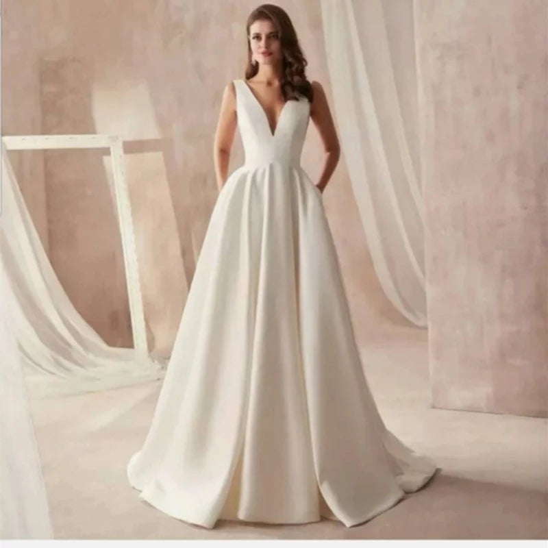 Vestido de novia corte A Clásico con bolsillos laterales en satín