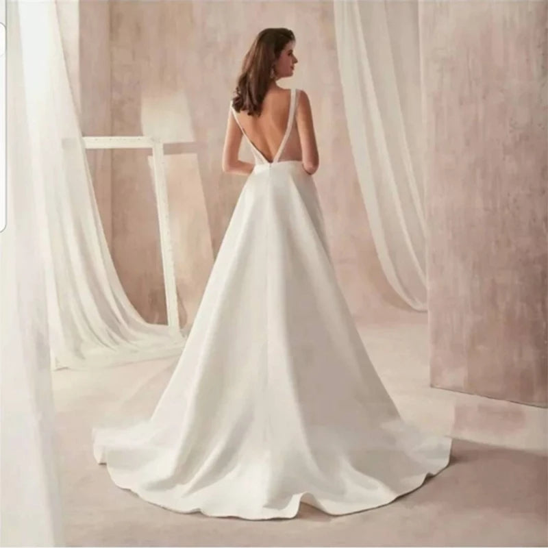 Vestido de novia corte A Clásico con bolsillos laterales en satín