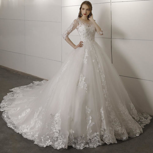 Vestido De Novia con mangas tres cuartos, espalda abierta.