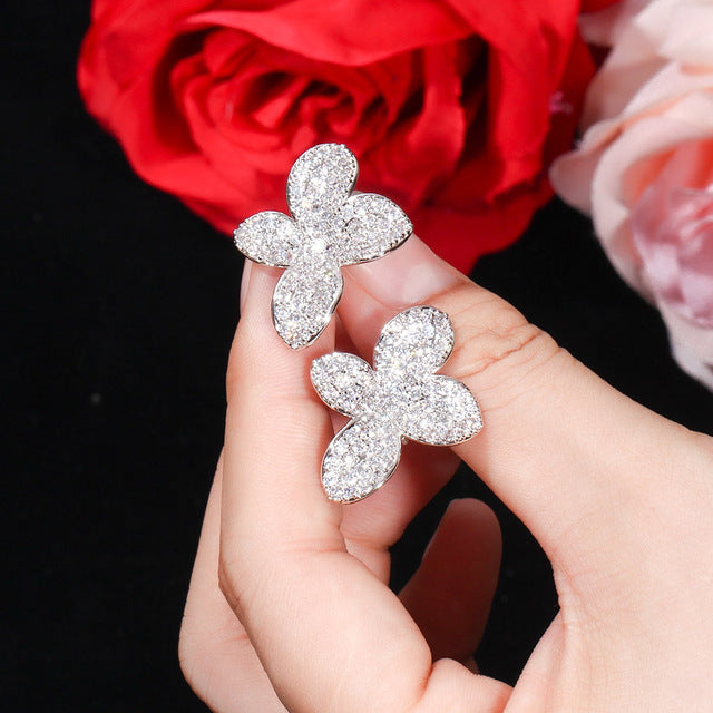 Hermosos aretes para novia en flor plata y oro rosado