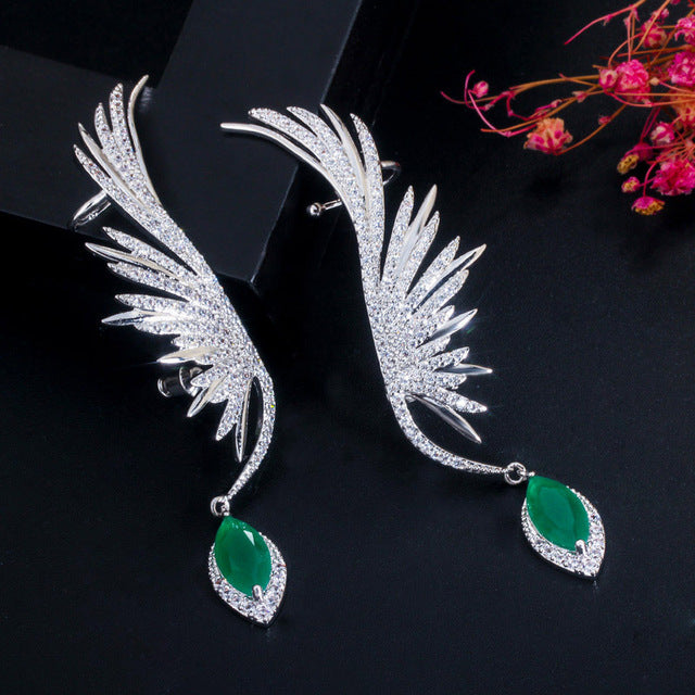 Hermosos aretes para novia de ala de ave con cristal