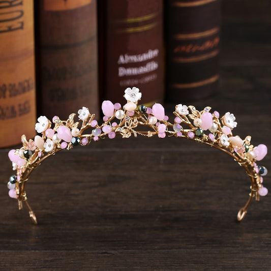 Preciosa tiara en detalles rosados con flores