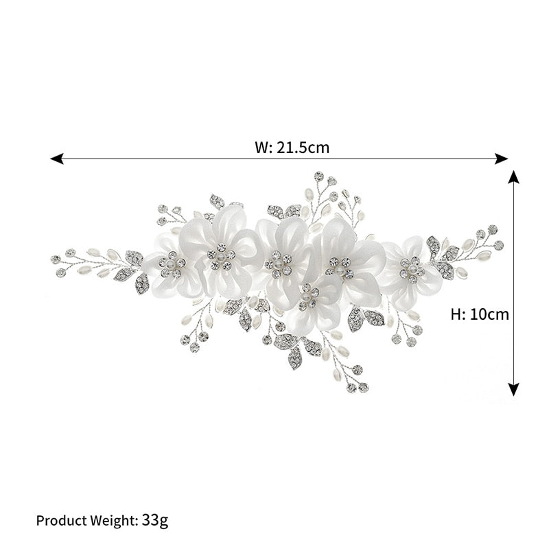 Juego de banda y peineta de lores blancas con cristales plata