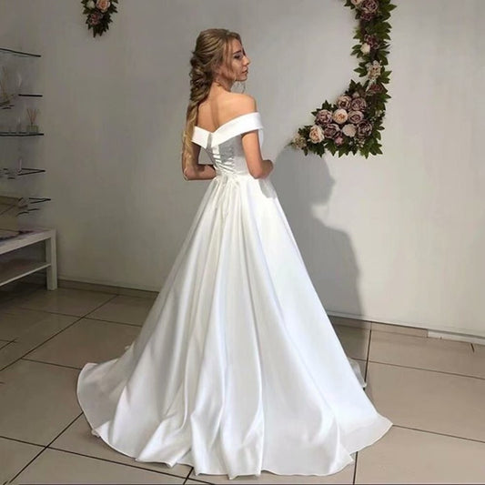 Vestido de novia clásico con mangas a los hombros