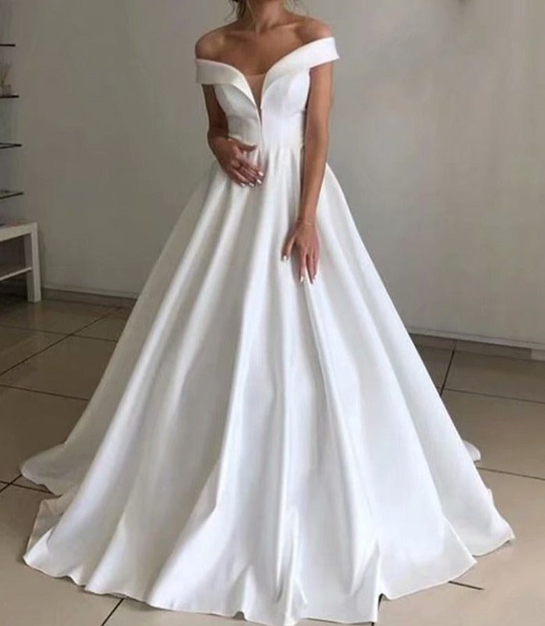 Vestido de novia clásico con mangas a los hombros